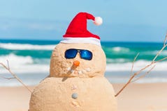 Snowman Made Out Of Sand With Santa Hat Stock Photography Snowman Made Out Of Sand With Santa Hat Stock Photography
