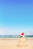 Snowman Made Out Of Sand With Santa Hat Royalty Free Stock Photography Snowman Made Out Of Sand With Santa Hat Royalty Free Stock Photography