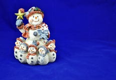 Snowman With Children Stock Image