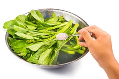 Soak vegetable in water with salt to remove pesticides residues