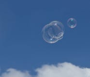 Soap bubbles are floating before bright blue sky royalty free stock photography Soap bubbles are floating before bright blue sky royalty free stock photography
