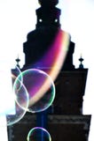 Soap bubbles among town hall stock images Soap bubbles among town hall stock images