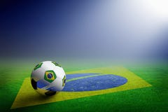 Soccer ball and flag of Brazil royalty free stock photography Soccer ball and flag of Brazil royalty free stock photography