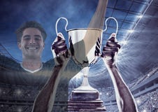 Soccer player wining the cup and two images are superimpose stock photography Soccer player wining the cup and two images are superimpose stock photography