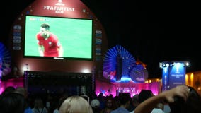 SOCHI, RUSSIA - June 15, 2018: FIFA 2018. broadcast the game on the screen in the seaport. fans are watching the live stock video SOCHI, RUSSIA - June 15, 2018: FIFA 2018. broadcast the game on the screen in the seaport. fans are watching the live stock video