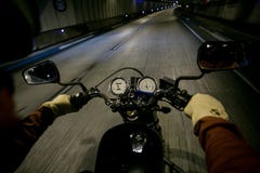 POV of biker ride motorcycle in tunnel royalty free stock image POV of biker ride motorcycle in tunnel royalty free stock image