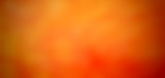 A softly blurred orange textured bokeh abstraction for the background.