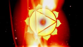 Solar Plexus Manipura Chakra Mandala Spins in Golden Energy Field of Fire