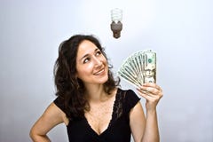 Soldi economizzatori d'energia Immagine Stock Soldi economizzatori d'energia Immagine Stock