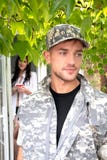 Soldier leaving home as wife watches on royalty free stock photos Soldier leaving home as wife watches on royalty free stock photos