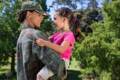 Soldier reunited with her daughter stock image Soldier reunited with her daughter stock image