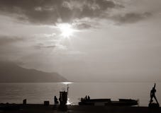 Solnedgång i Genève sjön royaltyfri bild Solnedgång i Genève sjön royaltyfri bild