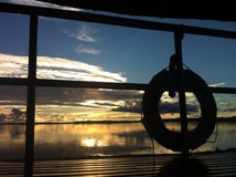 Solnedgång på Amazon River royaltyfri foto Solnedgång på Amazon River royaltyfri foto