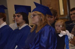 Couple high school gradiates at their graduation royalty free stock images Couple high school gradiates at their graduation royalty free stock images