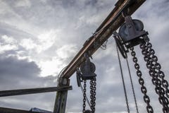 Hanging chains at the old dock stock photography Hanging chains at the old dock stock photography