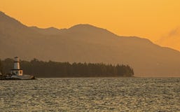 Sonnenaufgang und Leuchtturm über großem BH D ` oder auf Kap-Bretonisch, Nova Scotia stockbilder Sonnenaufgang und Leuchtturm über großem BH D ` oder auf Kap-Bretonisch, Nova Scotia stockbilder