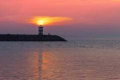Sonnenuntergang über dem Leuchtturm Stockbilder Sonnenuntergang über dem Leuchtturm Stockbilder