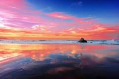 Sopelana beach at sunset with clouds reflections. Sopelana beach at the sunset with clouds reflections stock photo Sopelana beach at sunset with clouds reflections. Sopelana beach at the sunset with clouds reflections stock photo