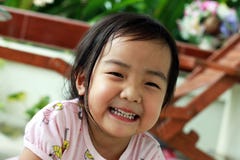 Sorriso da menina foto de stock royalty free Sorriso da menina foto de stock royalty free