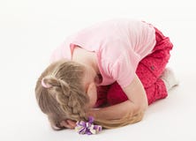 Sorrowful little girl on the floor. White background royalty free stock photo Sorrowful little girl on the floor. White background royalty free stock photo