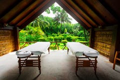 Spa beds ready to massage at outdoors tropical island Stock Photos Spa beds ready to massage at outdoors tropical island Stock Photos