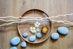 Spa decor for chic ayurveda with flow of stones and candle Royalty Free Stock Photo Spa decor for chic ayurveda with flow of stones and candle Royalty Free Stock Photo