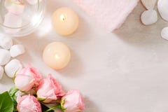 Spa settings with roses. Spa theme with candles and flowers on t royalty free stock image Spa settings with roses. Spa theme with candles and flowers on t royalty free stock image