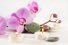 Spa still life with aromatic candles flower and stones royalty free stock photography Spa still life with aromatic candles flower and stones royalty free stock photography