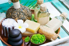 Spa and wellness massage setting, candle, stones. Royalty Free Stock Photography Spa and wellness massage setting, candle, stones. Royalty Free Stock Photography