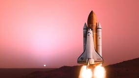 Space shuttle launch animation from Mars planet surface. Elements provided by NASA images
