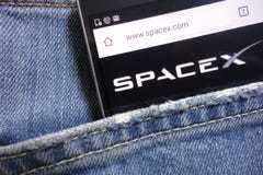 SpaceX website displayed on smartphone hidden in jeans pocket royalty free stock image SpaceX website displayed on smartphone hidden in jeans pocket royalty free stock image