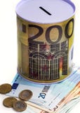 Spargris för pengar med bilden av eurosedlar, arkivbilder Spargris för pengar med bilden av eurosedlar, arkivbilder