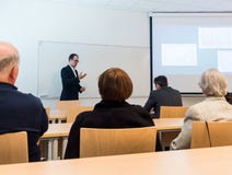 Speaker giving a presentation at business conference. royalty free stock image Speaker giving a presentation at business conference. royalty free stock image