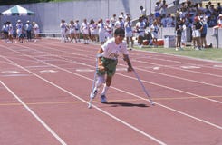 Special Olympics athlete on crutches Stock Photos Special Olympics athlete on crutches Stock Photos