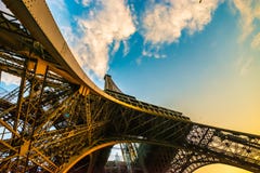 Amazing unique colourful wide angle shot of the Eiffel tower from below, showing all pillars. Stock Photo Amazing unique colourful wide angle shot of the Eiffel tower from below, showing all pillars. Stock Photo