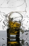 Spectacular High Speed shot of whiskey Glasees breaking