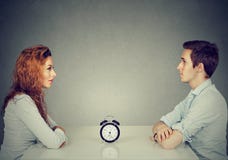 Speed dating. Man woman sitting across from each other at table stock images Speed dating. Man woman sitting across from each other at table stock images