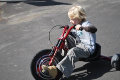 Speedy Child On A Bike Stock Photography