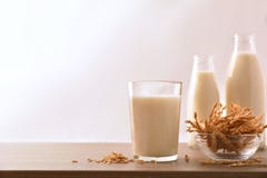 Spelled drink in containers with white background stock image Spelled drink in containers with white background stock image