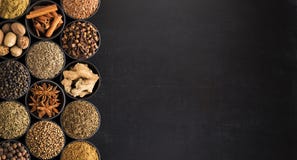 European spices in vintage style, top view. seasoning on black royalty free stock photography European spices in vintage style, top view. seasoning on black royalty free stock photography