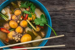 Spicy foods that used small eggs of the chicken to replace shrimp with squid, Thailand people called 'Tom Yum' royalty free stock images Spicy foods that used small eggs of the chicken to replace shrimp with squid, Thailand people called 'Tom Yum' royalty free stock images