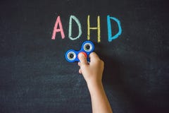 Spinnerhulp met ADHD-syndroom ADHD is hype van het Aandachtstekort stock afbeeldingen Spinnerhulp met ADHD-syndroom ADHD is hype van het Aandachtstekort stock afbeeldingen