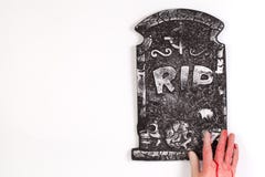 Spooky graveyard with zombie hand coming out of the ground royalty free stock image Spooky graveyard with zombie hand coming out of the ground royalty free stock image