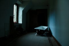 Spooky Hallway Of An Abandoned House With Light Coming Trough The Window To The Badthub! Stock Photos Spooky Hallway Of An Abandoned House With Light Coming Trough The Window To The Badthub! Stock Photos