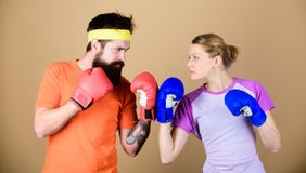 Sport for everyone. Amateur boxing club. Equal possibilities. Strength and power. Man and woman in boxing gloves. Family royalty free stock photos Sport for everyone. Amateur boxing club. Equal possibilities. Strength and power. Man and woman in boxing gloves. Family royalty free stock photos