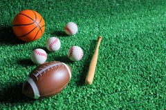 Sports accessories. sticks, balls on Green background royalty free stock image Sports accessories. sticks, balls on Green background royalty free stock image
