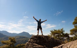 Sportsman On The Top Of Rock. Sport And Active Stock Photos