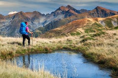 Sporty hiker woman in Fagaras mountains, Carpathians, Transylvania, Romania, Europe royalty free stock image Sporty hiker woman in Fagaras mountains, Carpathians, Transylvania, Romania, Europe royalty free stock image