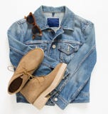 Spring, autumn female outfit. Set of clothes, shoes and accessories on white background. Blue denim jacket and camel shoes. royalty free stock photo Spring, autumn female outfit. Set of clothes, shoes and accessories on white background. Blue denim jacket and camel shoes. royalty free stock photo