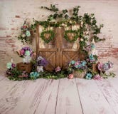 Spring sett up with colourful flowers pink, purple, turqoise and vintage wood parquet